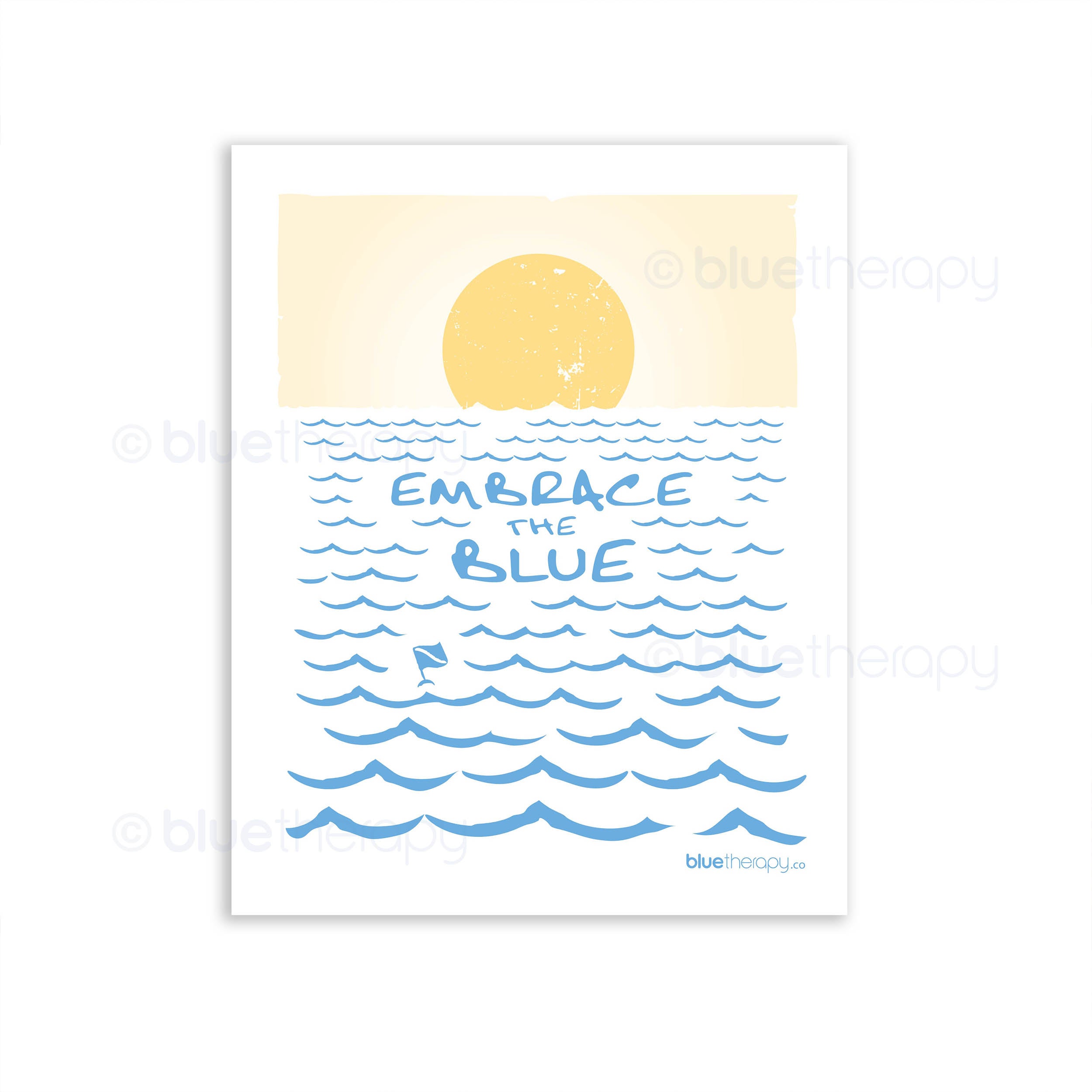 BlueTherapy Embrace the Blue wall art print: sunset over ocean waves in yellow and blue tones, with 'Embrace the Blue' handwritten text
